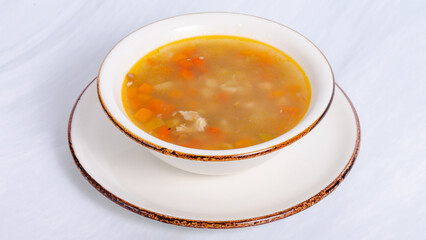 Chicken soup bowl top view isolated