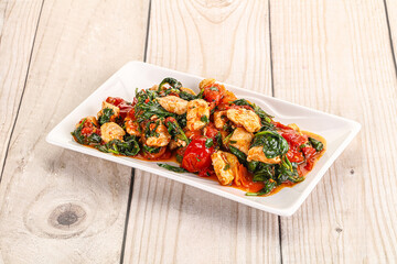 Chicken with tomato and spinach