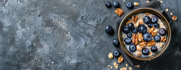 Fotobehang Blueberry and nut topped oatmeal © Oleksandr