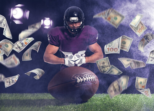 Win on sports betting, online bookmaker service. American football player, ball and flying dollars at stadium - Powered by Adobe