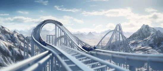 Afwasbaar Fotobehang Treinspoor An extreme, adrenaline-pumping rollercoaster track against a backdrop of blue skies and snowy mountains