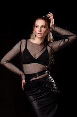 Fashion portrait of young beautiful woman with jewelry. Blond girl.