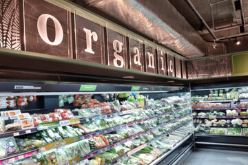 Organic signage or word on supermarket aisle that retails fresh, healthy and pesticide free vegetables and fruits