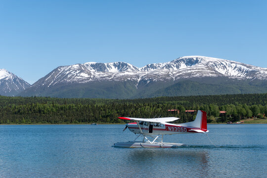 Port Alsworth, Alaska: Floatplane on Hardenburg Bay on Lake Clark in Lake Clark National Park and Preserve. Cessna 185 Skywagon seaplane.