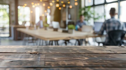 Empty wood tabletop with blurred bokeh people working in office interior - banner background for product display or montage