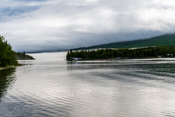 Port Alsworth, Alaska: Floatplane taking off on Hardenburg Bay on Lake Clark in Lake Clark National...