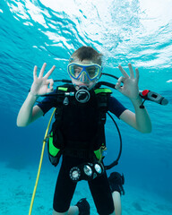 Youth scuba diving in the Caribbean underwater