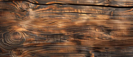 Fototapeten Twisted grains and burnt patterns add an enigmatic touch to this warm-toned wood texture © Daniel