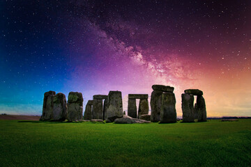 Landscape image of Milky way galaxy at night sky with stars over Stonehenge an ancient prehistoric...