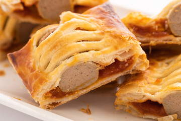 Dutch Snack Slice of Frikandelbroodje Oliehoorn bake off with sauce