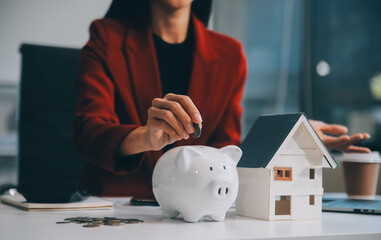 Businesswoman save money in piggy bank and goal and achievement chart graph and arrows. Funds loans...