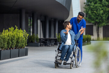 Smiling confident man in wheelchair having a walk with a male nurse