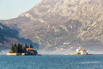 Saint George Island and Orthodox Church of Our Lady of the Rocks. Two churches on islets off the...