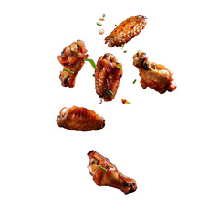 Buffalo chicken wings scattered, falling, or floating, sprinkled with herbs and spices, isolated on transparent background. 