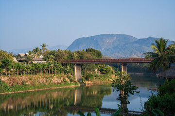 Fototapeta na wymiar The Nam Khan River, which flows into the Mekong River, is located in Luang Prabang, Laos, Asia.
