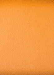 Abstract rough wall orange color background. Good wall wallpaper.