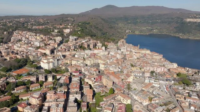Aerial view of Genzano di Roma. It is a town of Castelli Romani regional park, near Rome, Italy. The historic center is located in the Alban Hills overlooking Lake Nemi, a volcanic crater lake. 