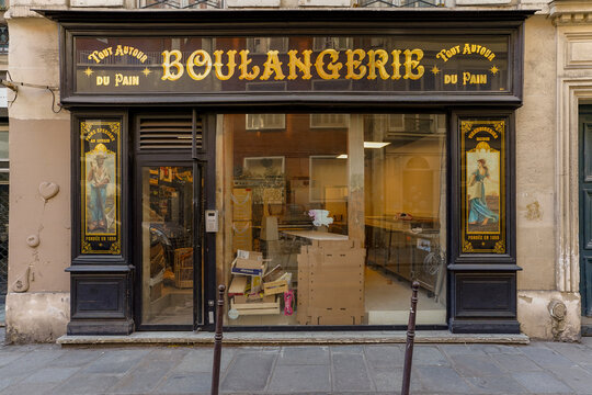 Paris France 05 june 2023 : fancy vintage parisian boutique facade , french bakery