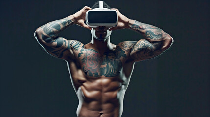 Fototapeta na wymiar Muscular tattooed man flexes his arms during virtual reality immersion, black background. Sports training, reboot in virtual reality, immersion in modern technology