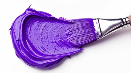Brush with violet paint on white background