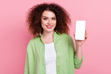 Photo portrait of pretty young girl hold telephone device white screen dressed stylish green outfit...