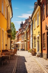 A charming cobblestone street with outdoor seating, perfect for a cafe scene
