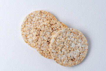 Pile of three rice cakes on white backdrop. Food background.