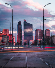 Warsaw, Poland - a view of a skyscrapers in the business part of the city.  Office buildings in the Center of Warsaw. Long exposure with light trails. Traffic lights