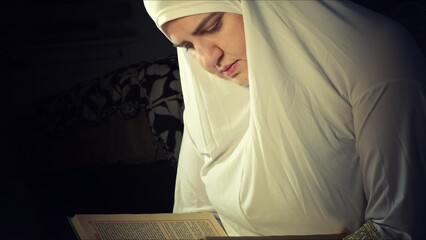 Religious muslim woman in prayer outfit - 747455850