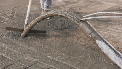 Workers work on concrete concreting floors of buildings in construction site, Concept pouring...