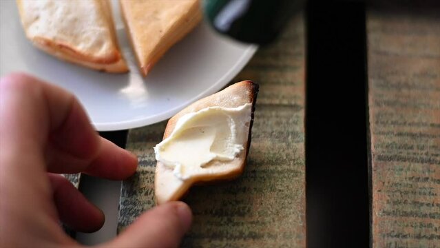 close-up slow motion video of fat cake with honey on top