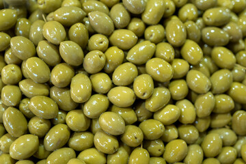 Background of organic olives close up. Flat lay.