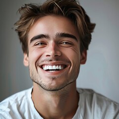 
A very happy man with a white smile after the dentist - obrazy, fototapety, plakaty