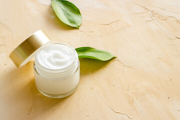 Moisturizing and nourishing cosmetic skin care cream in glass vial