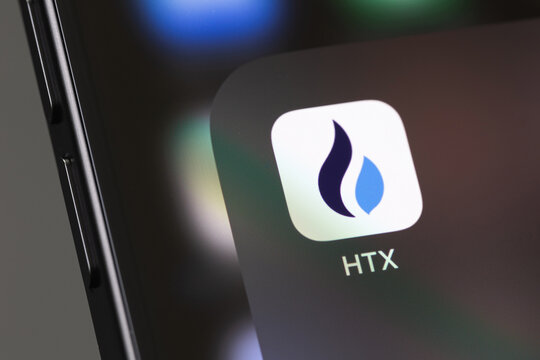 HTX, Huobi mobile icon app on a screen smartphone closeup. HTX (Huobi) - one of the largest cryptocurrency exchange on the market. Batumi, Georgia - December 3, 2023