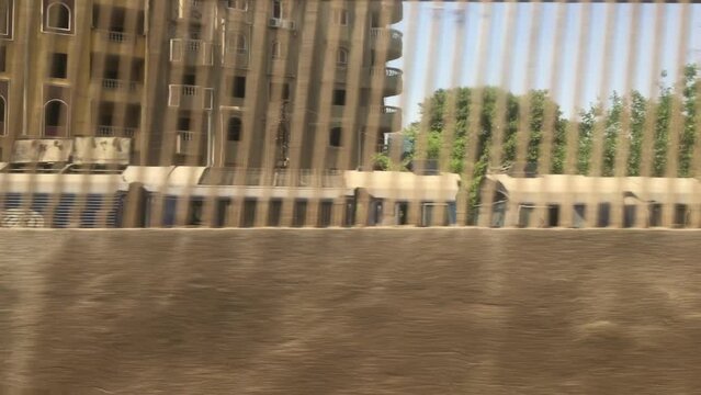 Sub-urban Cairo from the train window heading to Luxor