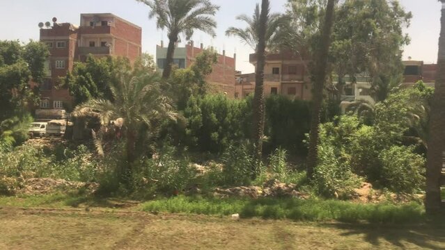 Middle eastern buildings with rubble around them in a rural area in Egypt