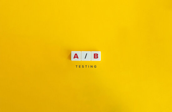 A/B or Split Testing Banner. Text on Block Letter Tiles on Yellow Background. Minimalist Aesthetic.