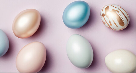 Composition of Easter eggs in mother-of-pearl shades on a light pink background