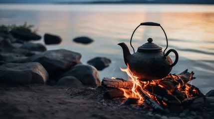 Keuken spatwand met foto Vintage coffee pot on camping fire. Wonderful evening atmospheric background of campfire. Romantic warm place with fire. The concept of adventure, travel, tourism and camping. © alexkich