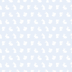 Easter seamless pattern of cute white bunny silhouettes