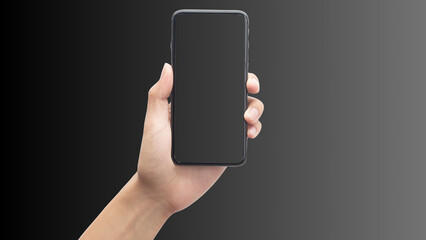 Hand holding cell phone mockup with blank screen. Smartphone mock up isolated on black bacground