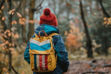 Back to school concept with a child carrying a backpack Ready for a new academic year Symbolizing education and growth - obrazy, fototapety, plakaty