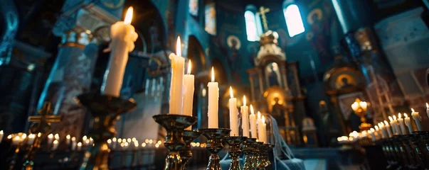 Fotobehang The candle flame in orthodox church, close up © Coosh448