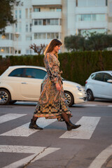 Woman Crossing the Street in a Dress