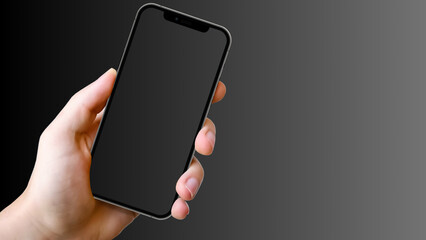 Hand holding cell phone mockup with blank screen. Smartphone mock up isolated on black bacground