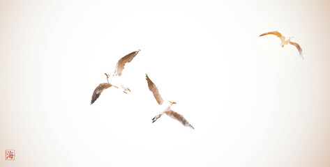 Minimalistic ink painting, displaying a trio of seagulls in flight. Traditional oriental ink painting sumi-e, u-sin, go-hua in vintage style. Hieroglyph - sea