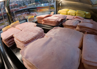 ham and cheese in showcase at market