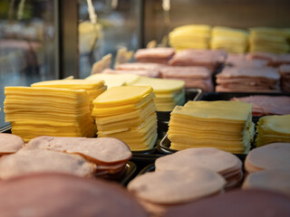 ham and cheese in showcase at market