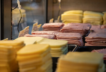 ham and cheese in showcase at market